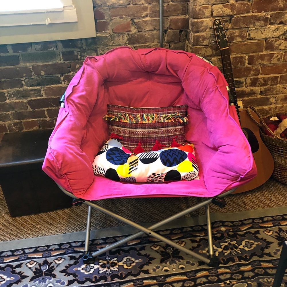 Pink fold out chair